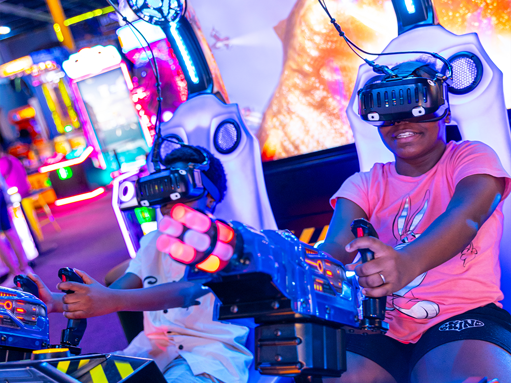 three young girls playing VR games